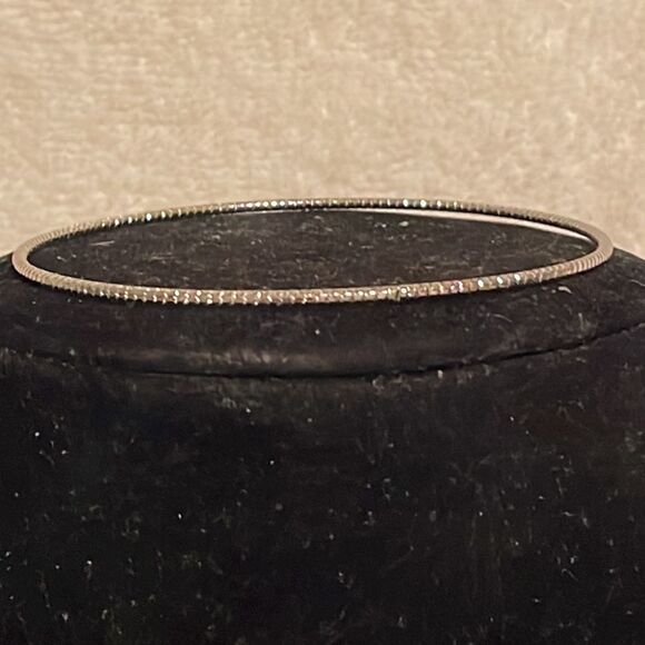 7.5” stackable polished silver tone bangle bracelet w/32 prong set crystals - Picture 4 of 12